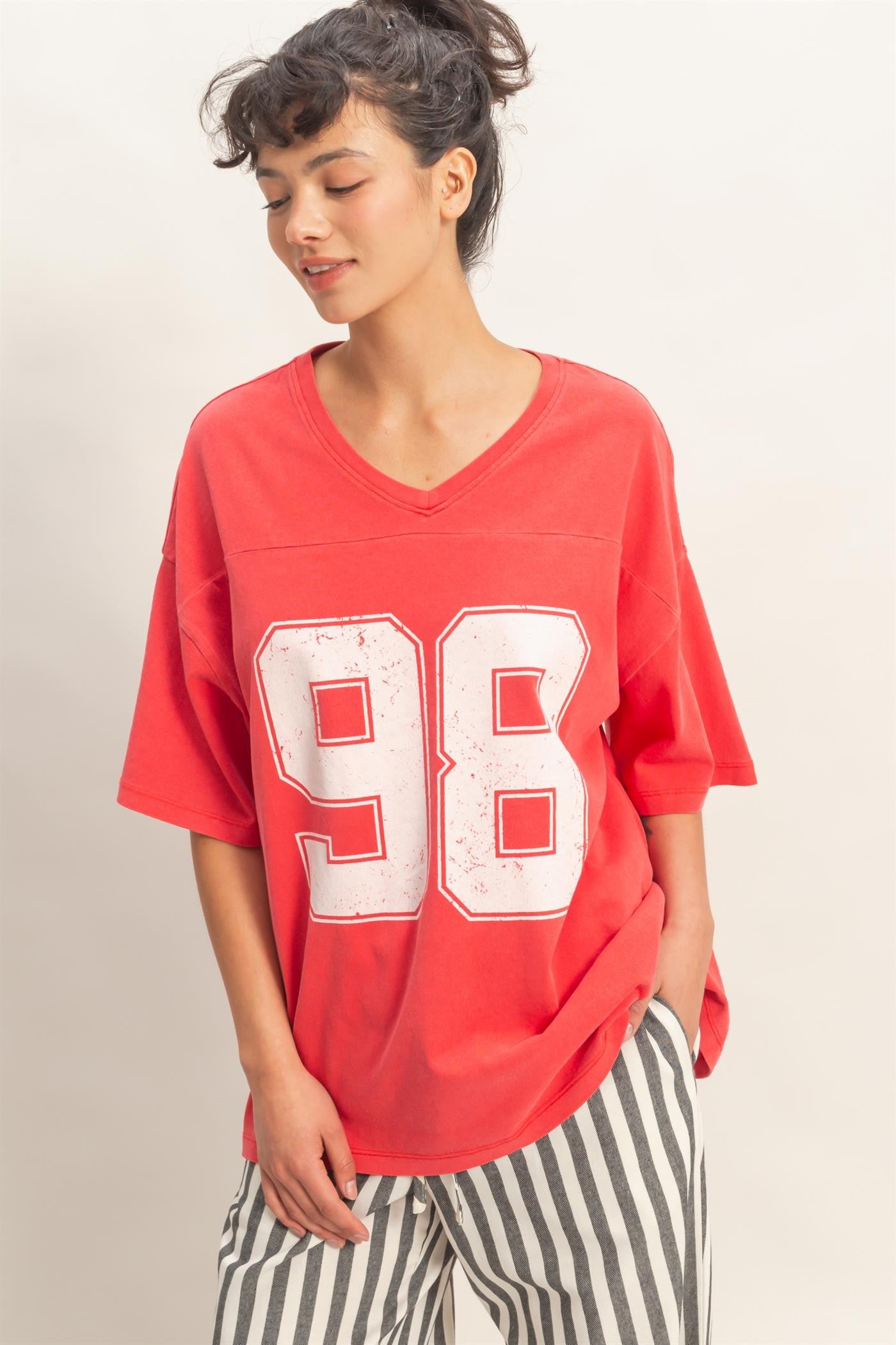 YAZ. Lexii Oversized Varsity Style V-Neck Graphic Tee