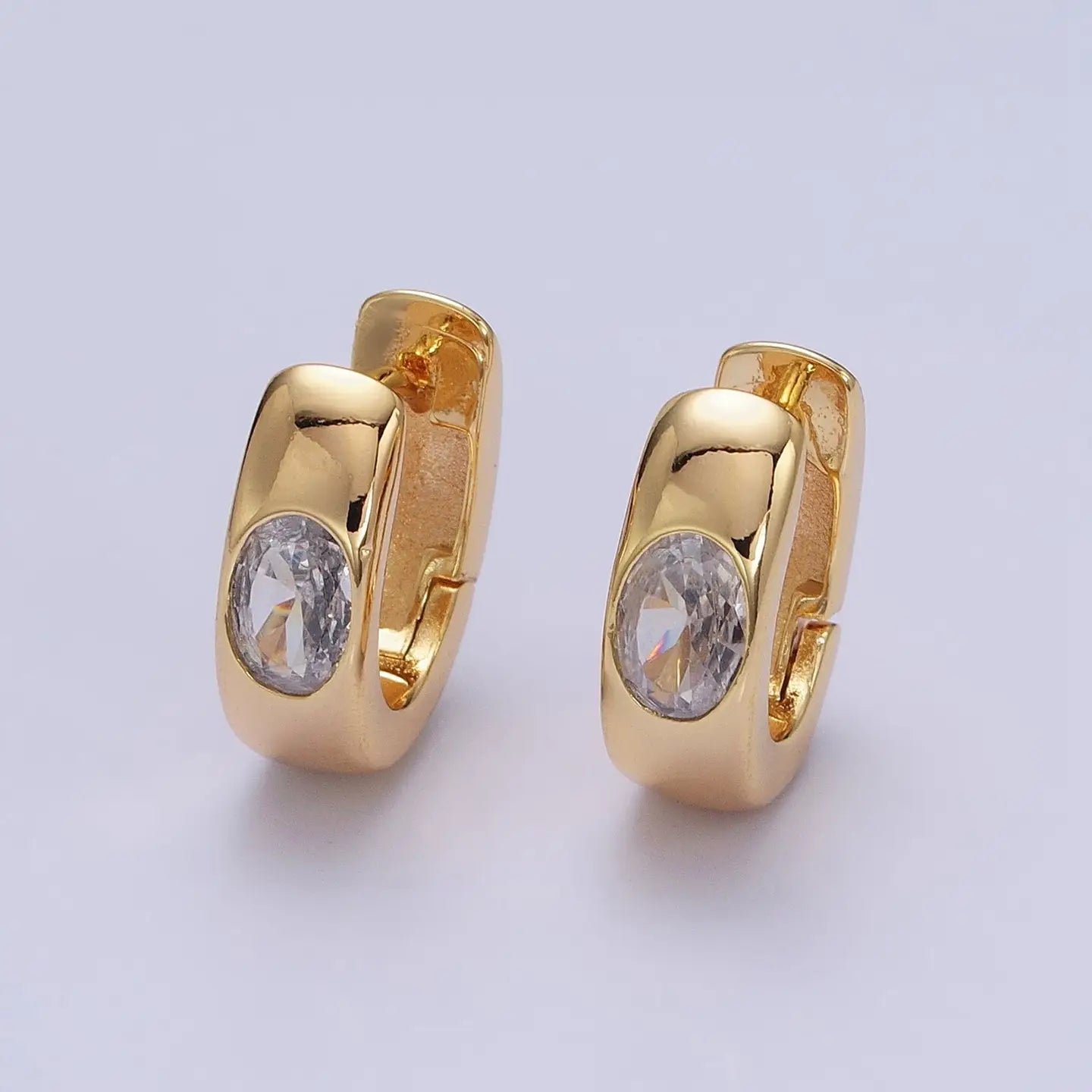Aim Eternal Gold Filled Clear Oval Cz 15mm Thick Huggie Earrings - Gold