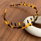 Dipped Shop Vintage Leopard Weave Toothed Acetate Headband by Dipped Shop