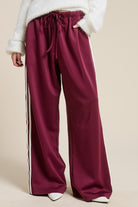GOLDEN Vera Wide Leg Track Pants With Side Stripes Maroon