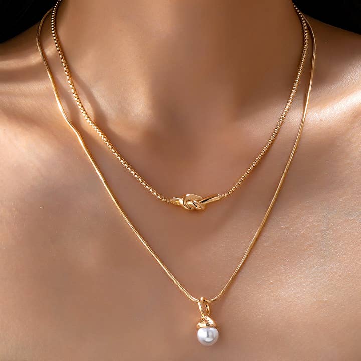 JOSSLYN by Wall to Wall Layer Knot & Acorn Pendant Duo Drop Necklace