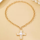 JOSSLYN by Wall to Wall Hammered Cross Pearl Necklace