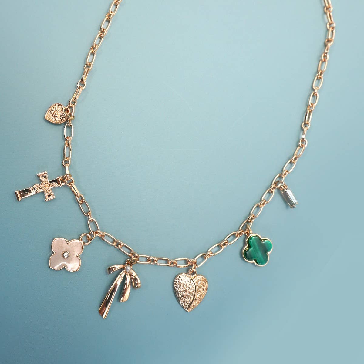 JOSSLYN by Wall to Wall Charm Necklace-Green Clover Bow Cross Heart Gold