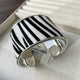 YAZ. Animalistic Metal Hide Open Bracelet by YAZ.