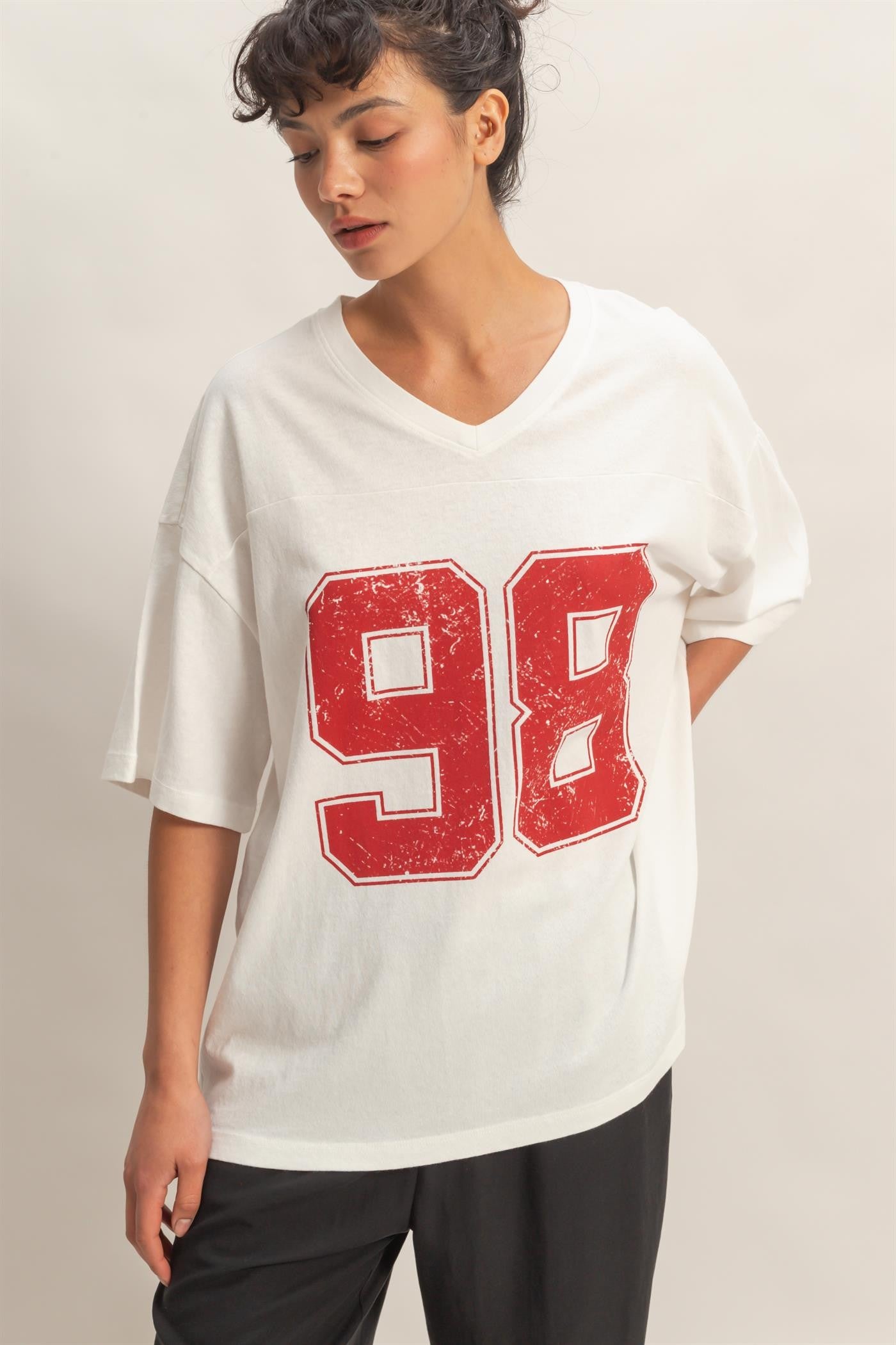 YAZ. Lexii Oversized Varsity Style V-Neck Graphic Tee