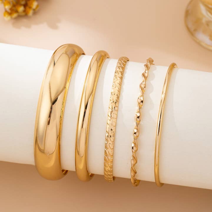JOSSLYN by Wall to Wall Gold Textured Bangle Stack Set by JOSSLYN by Wall to Wall
