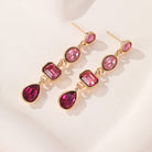JOSSLYN by Wall to Wall 4 Tier Drop Layer Rhinestone Earrings | 40E527 by JOSSLYN by Wall to Wall