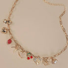 JOSSLYN by Wall to Wall Multi Charm Bow Cherry Heart Necklace Gold