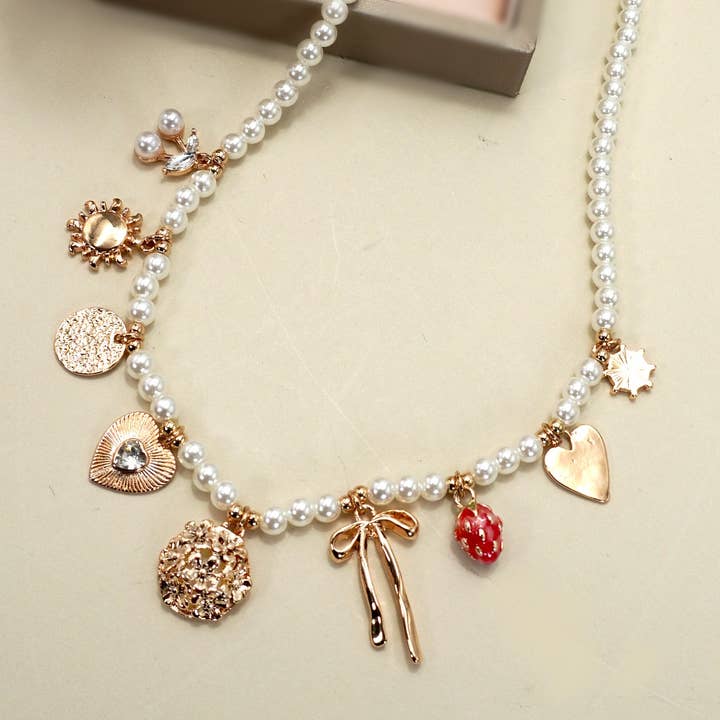 JOSSLYN by Wall to Wall Pearl Beaded Bow Strawberry Cherry Necklace