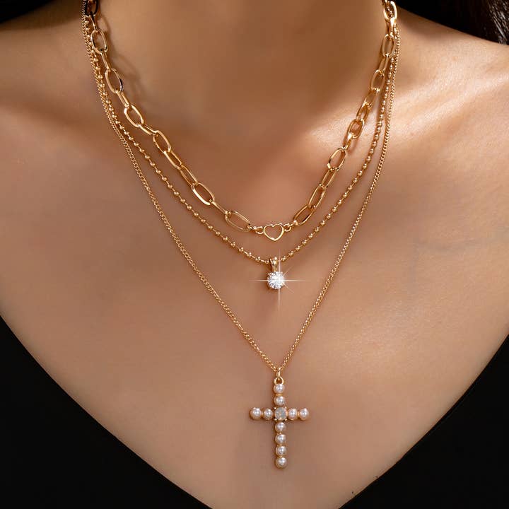 JOSSLYN by Wall to Wall Multi-Layered Pearl Cross Rhinestone Necklace | 80N93577 by JOSSLYN by Wall to Wall